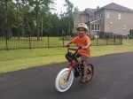 30 minutes off of training wheels and he is riding his bike.